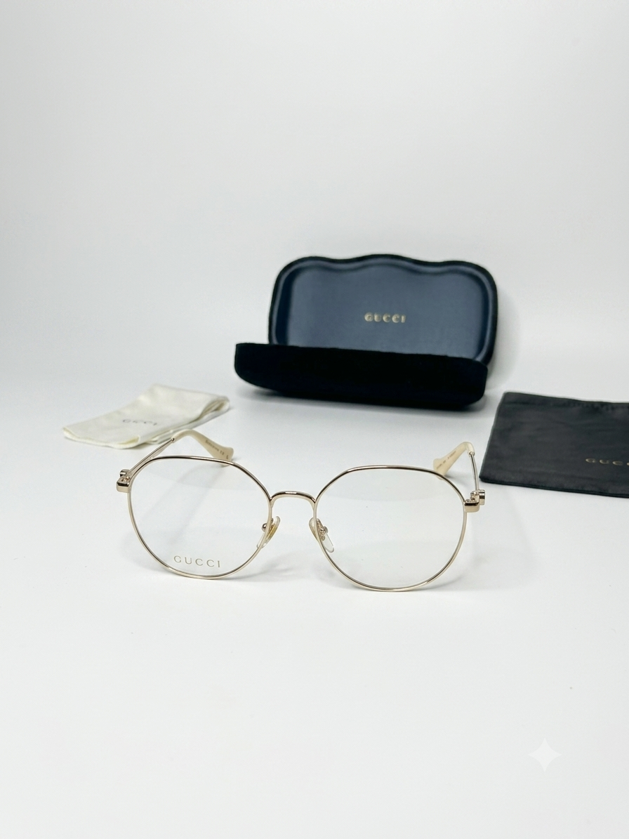 Gucci GG1145O – Złote Oprawki Optyczne z Kremowymi Zausznikami