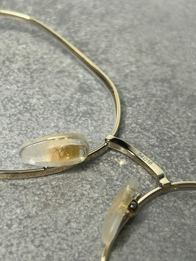 Gucci GG1145O – Złote Oprawki Optyczne z Kremowymi Zausznikami